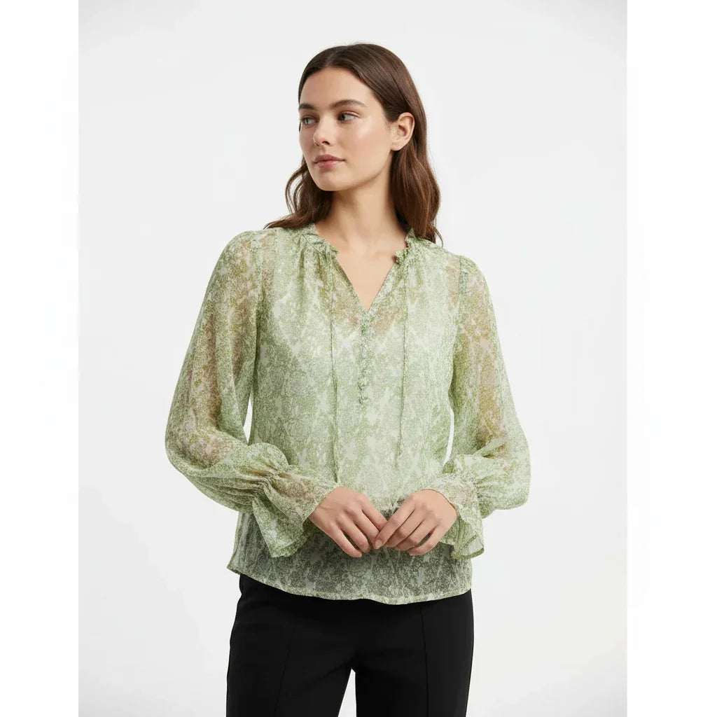 Blouse femme vert clair à manches longues et détails volants, style tendance et élégant