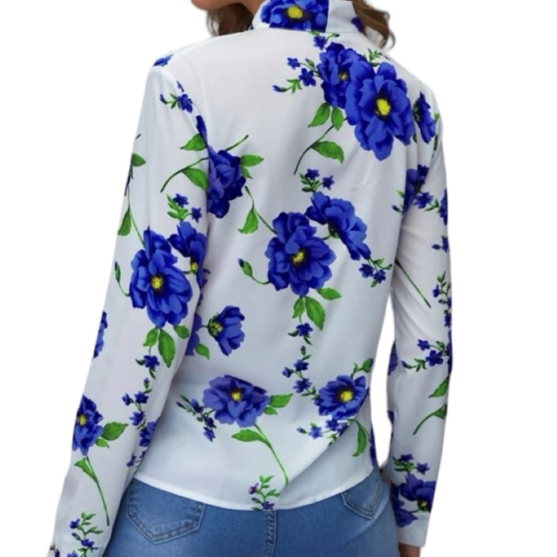 Une blouse design élégante et féminine, parfaite pour se démarquer! La blouse blanche design C'est Elle est faite d'un tissu blanc doux et soyeux, orné d'éclatantes fleurs bleu royale et d'un ravissant noeud au col. Rendez-vous remarqué avec c'est elle boutique et rayonner au quotidien!