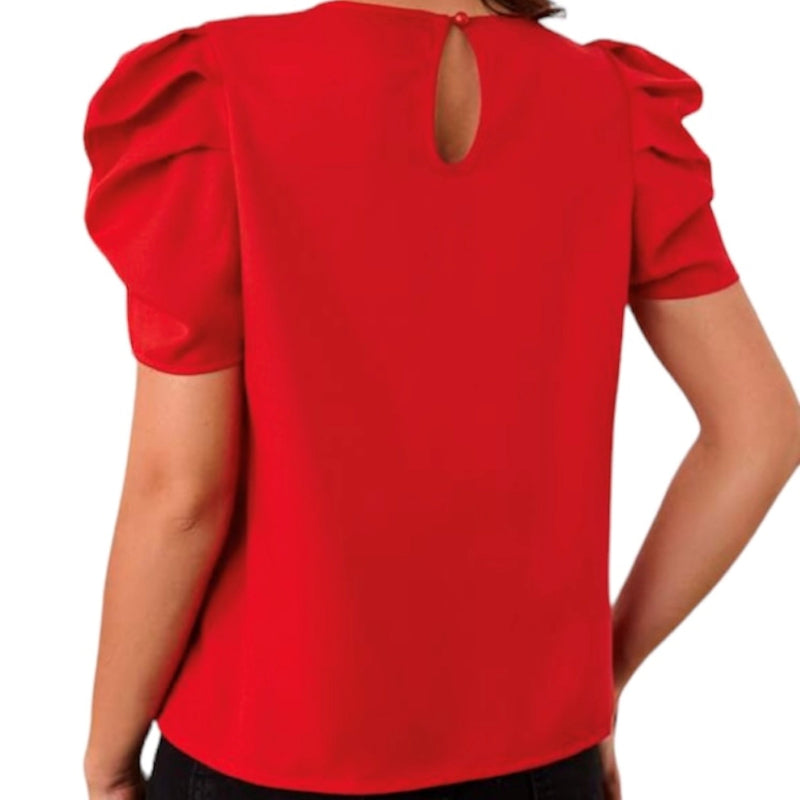 Une pièce chic et originale parsemé de perle blanche , cette blouse manche bouffante rouge est parfaite pour un look tendance. Une pièce élégante et intemporelle pour compléter n'importe quelle tenue.