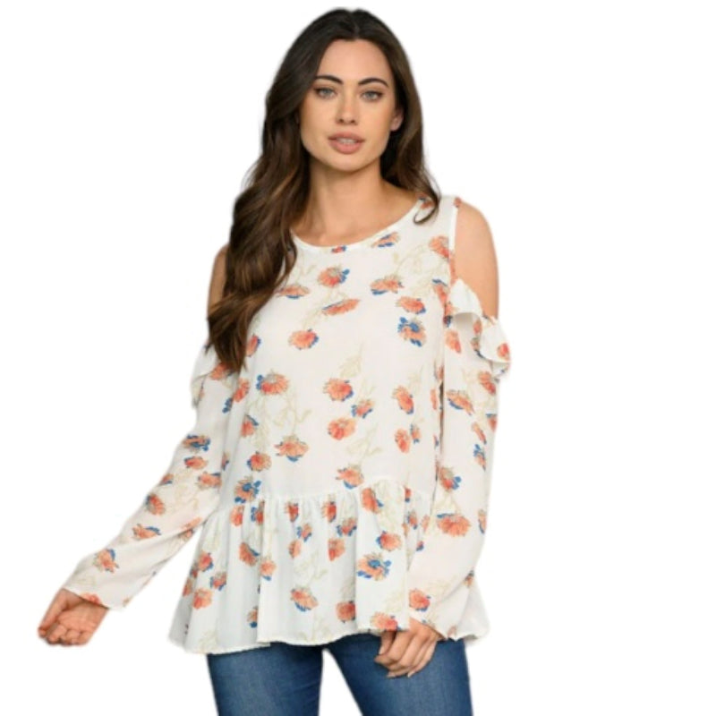 Vous aimeriez cette blouse pour femme de la marque C'est Elle avec un petit volant au bras. De jolies fleurs pour égayer vos journées. Enfilez cette blouse blanc cassé C'est Elle fleurie pour montrer vos épaules et apporter une touche audacieuse à votre look ! Les fleurs colorées ajoutent une touche de style et de joie. Restez cool et affirmé avec cette blouse chic. Vivez la vie avec C'est Elle !