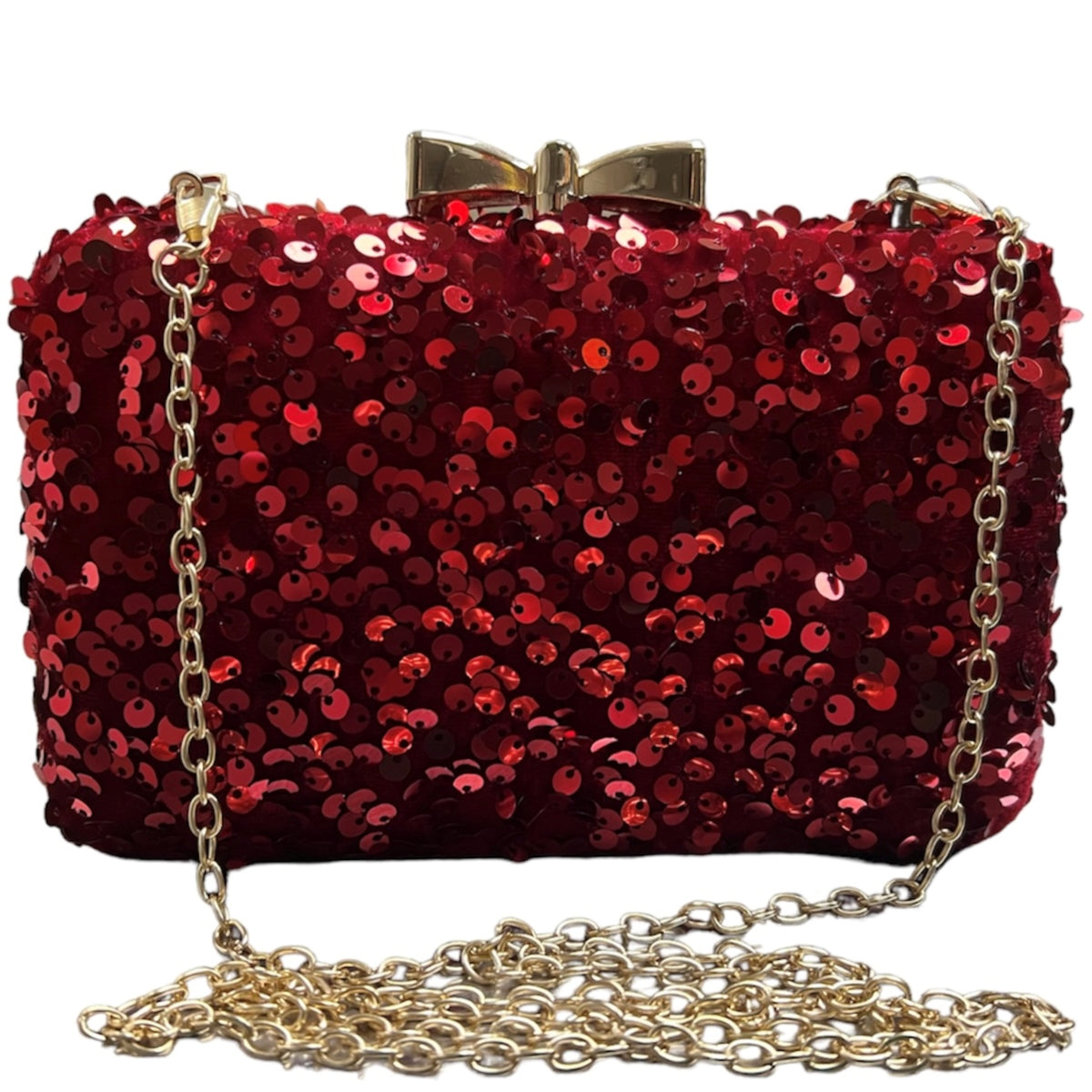 Ce sac de soirée rouge en velour parsemée de paillettes se révèlera être l'accessoire idéal pour votre tenue. Sa taille parfaite et ses paillettes brillantes sublimeront votre look. Laissez-vous parler par cet élégant petit bijou de 19x12 cm.